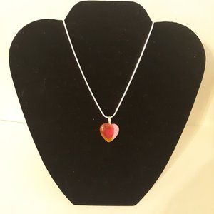 Polished and cut handmade 3/4" stone heart & 16" 925 silver chain.